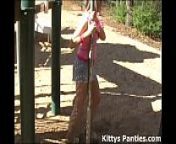 Innocent teen Kitty flashing her pink panties from upskirt playground