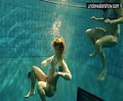 Two sexy amateurs showing their bodies off under water from nudist world nudist