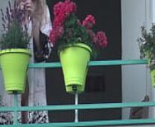 Blonde hot neighbour accidentally flashing her pussy on the balcony from accidental nudity