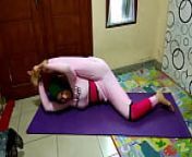 Muslim Woman Doing Yoga Stretching from muslim woman stretched