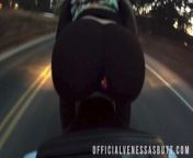 biker babe rides motorcycle in public with light up flashing buttplug from calia qadehs butt plug