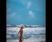 Tik Tok. Beach Voyeur looks on Blonde Teen enjoying Topless in the waves. from indian girl look flash dickkarsha xxxnagta nika koel sex pornhubn female new